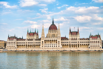 Obraz na płótnie Canvas Hungarian parliament building along Danube river, Budapest - Hungary