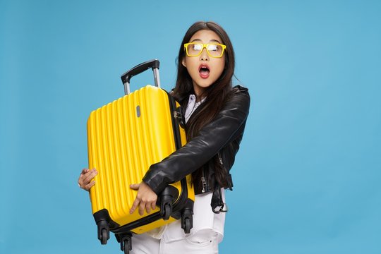 Cheerful woman luggage vacation passenger airport