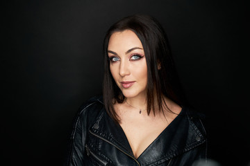 Beautiful Black hair woman beautiful portrait. Hairstyle curly hair beauty female model girl over dark background