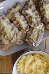 Cooked Karelian pies - Pirakka on a baking sheet. Dish of national cuisine - piirakka. Close-up.