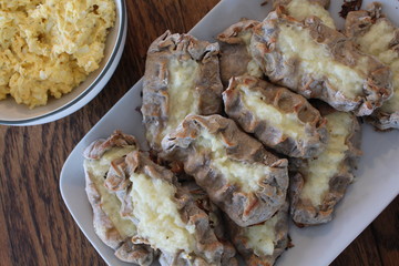Cooked Karelian pies - Pirakka on a baking sheet. Dish of national cuisine - piirakka. Close-up.