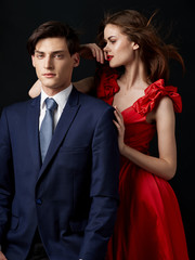 Beautiful men and women charm luxury portrait dark background romance