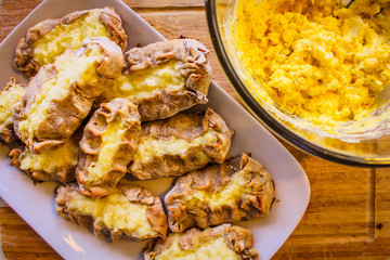 Cooked Karelian pies - Pirakka on a baking sheet. Dish of national cuisine - piirakka. Close-up.