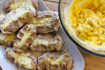 Cooked Karelian pies - Pirakka on a baking sheet. Dish of national cuisine - piirakka. Close-up.