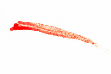 Drop of flesh scarlet  blood finger smeared on paper. Bloody track or line stroke.