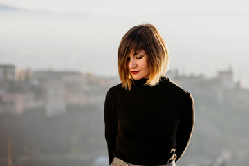 woman posing in a viewpoint