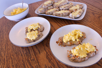 Close up view on freshly baked Karelian Pie with egg butter, a traditional topping to this dish in Finland