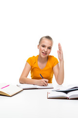 Educational Ideas. Portrait of Smiling Caucasian Teenager Girl Posing with Books and Lifted Hand....