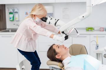 Kid at a clinic, Little doctor, playing dentistry