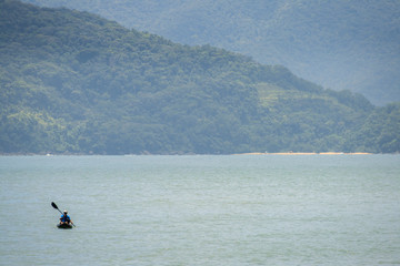 Lonely man on the kayak