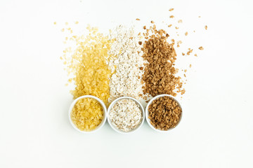 Different kinds of grain, rice, peas, rye, millet, an oats, millet, barley.