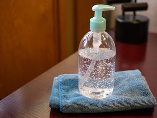 Bottle of hand sanitizer, hand disinfecting gel. Crucial for coronavirus prevention through...