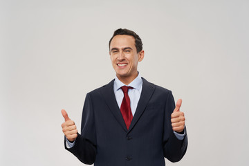 Cheerful business man in suit tie with hands gesture manager Office