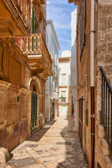 Typical Narrow Streets Of Medieval City Center In Polignano A Mare Apulia Italy