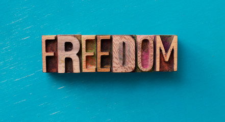 Freedom word written with wood type blocks