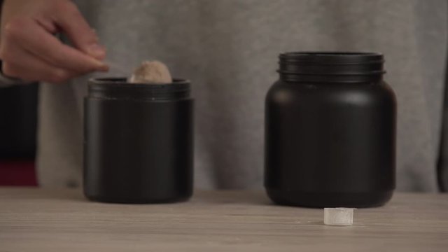 Showing whey protein powder, close up.