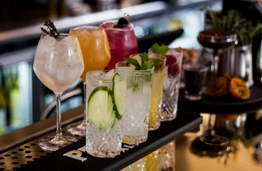 Foto op Plexiglas Classy bar with loads of drinks being showcases on the bar shelf © Bart