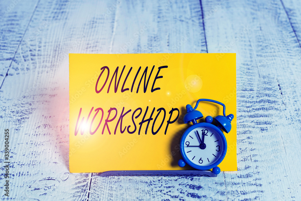Poster writing note showing online workshop. business concept for intensive discussion and activity on a pa