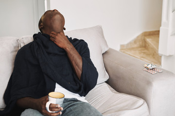 sick woman taking pills