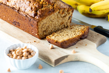 Freshly baked butterscotch chip banana bread, sliced into and ready for eating.