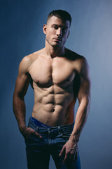 Fototapeta na wymiar Men's chest inflated torso fitness bodybuilder