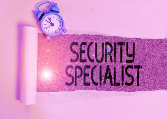 Writing note showing Security Specialist. Business concept for specializes in the security of...