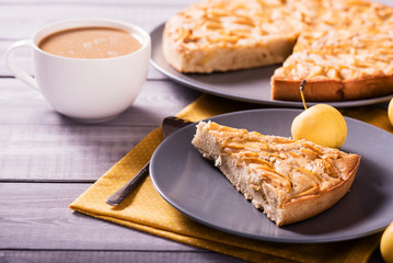 Apple pie on the wooden backgraund