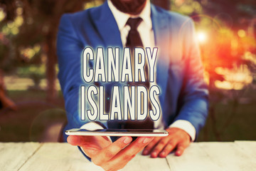 Conceptual hand writing showing Canary Islands. Concept meaning a group of mountainous islands in...
