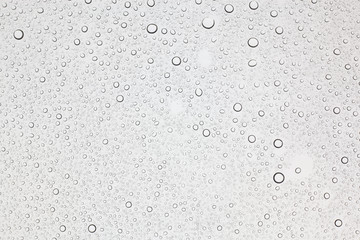 Rain droplets on glass background, Water drops on glass.