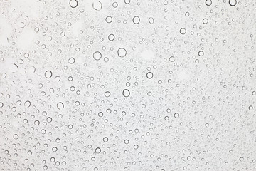 Rain droplets on glass background, Water drops on glass.