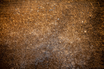 Splashes of water and bokeh of Water on a Sunset Background.