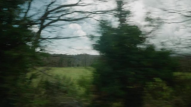 POV View From Window On Carhaix to Guingamp Train Going Past Rural Countryside In France. Follow Shot
