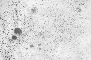 White bath foam bubbles texture background.