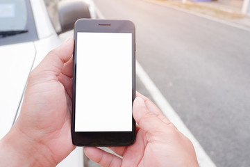 Cropped shot view of business human’s hands holding the mobile phone with blank copy space screen for your information content or text message, the woman reading text message on the smart phone during