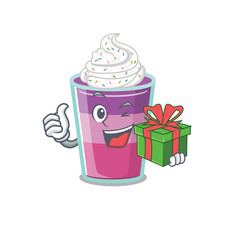 Smiling cocktail jelly cartoon character having a green gift box