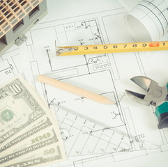 Electrical diagrams, work tools for engineer jobs, small house and currencies dollar, building home...