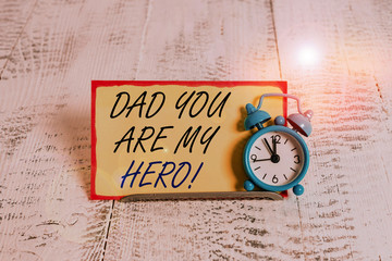 Writing note showing Dad You Are My Hero. Business concept for Admiration for your father love...