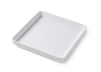 White plate placed on a white background