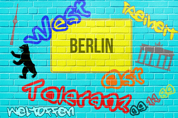 Eine Mauer und Hinweis auf Berlin