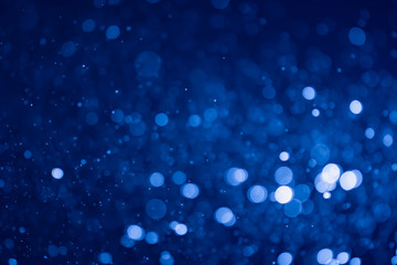Blue glitter bokeh of light.Abstract blurred light