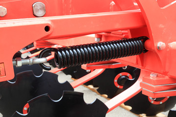 Fototapeta premium Image cushioning springs of the cultivator.