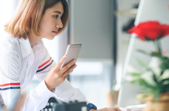 Attractive businesswoman working in modern office.