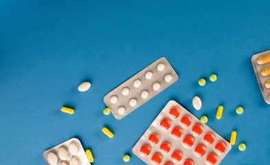 pills on a blue background
