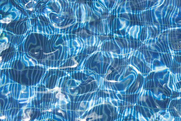 Fototapeta na wymiar Swimming pool water textured background