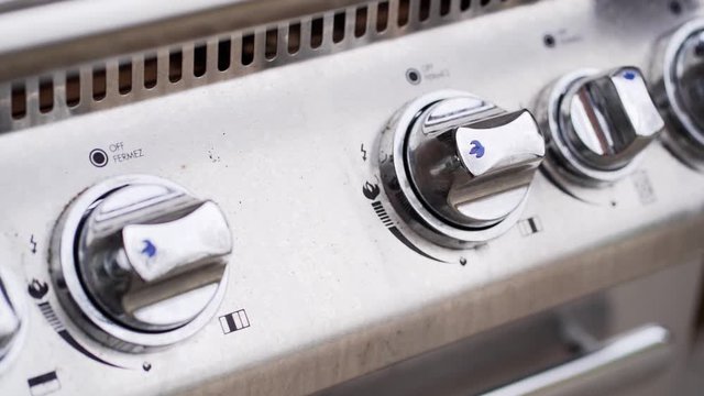 BBQ burner knobs dolly shot