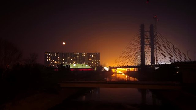 Bridge construction site at night cityscape time lapse , Ciurel junction, Bucharest, Romania