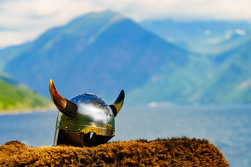 Viking helmet on fjord shore, Norway