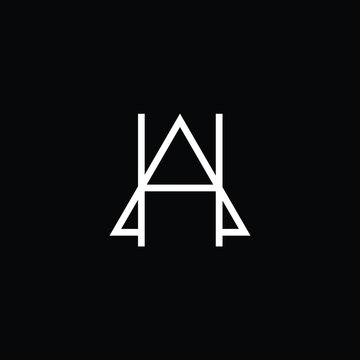 Minimal elegant monogram art logo. Outstanding professional trendy awesome artistic AH HA initial based Alphabet icon logo. Premium Business logo White color on black background