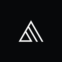 Minimal elegant monogram art logo. Outstanding professional trendy awesome artistic AM MA initial based Alphabet icon logo. Premium Business logo White color on black background