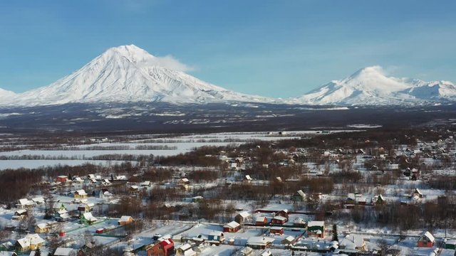 Kamchatka's home volcanoes tower over the city of Petropavlovsk-Kamchatsky. Taken in winter from a quadrocopter